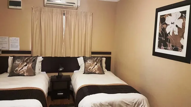 غرفة فاخرة بسرير كينج بغرفة نوم واحدة، Tsessebe Guesthouse 8/10