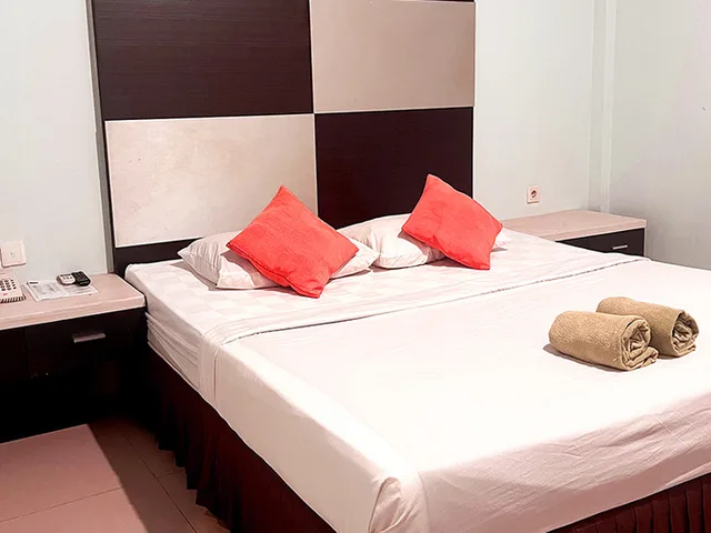 غرفة ديلوكس بسرير مزدوج، Grand Global Hotel Palangka Raya 1/4