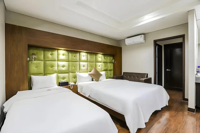 غرفة بسرير مزدوج وسرير فردي، Hotel Tj 1/4