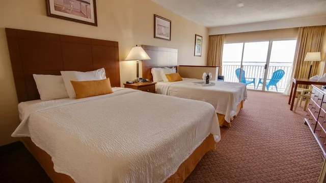 Efficiency, Deluxe, 2 Queen Beds, Bay View, Sofa, South Building، Princess Bayside Beach Hotel 1/10