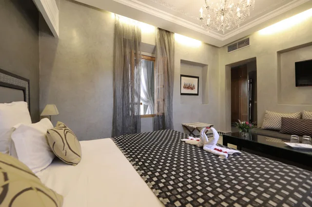 غرفة بسريرين منفصلين مع أريكة، Riad L Etoile D Orient 1/2