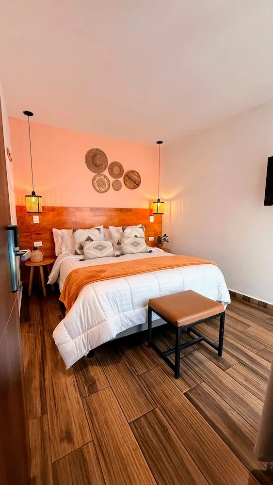 غرفة تقليدية بسرير كوين بشرفة، La Martina Boutique Hotel 4/6