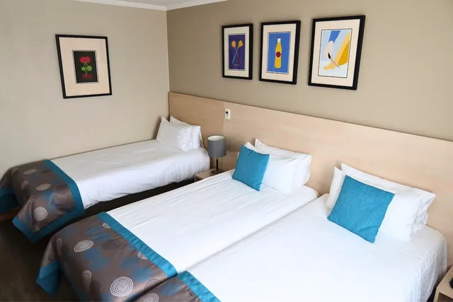 غرفة قياسية ثلاثية بسريرين منفصلين مع أريكة، Everness Hotel and Resort 6/10