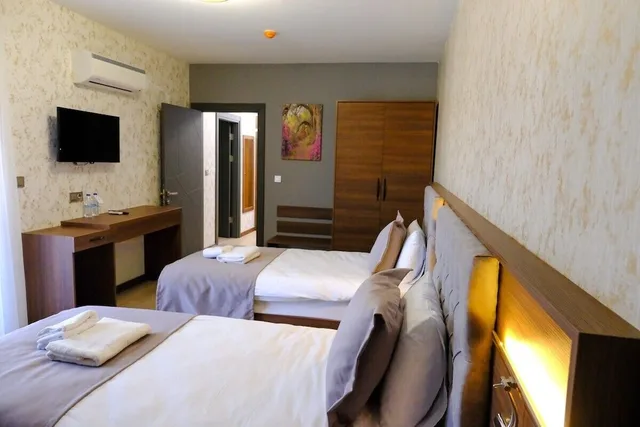 جناح غراند بسرير كوين وسريرين منفصلين، Grand Salizze Hotel 5/9