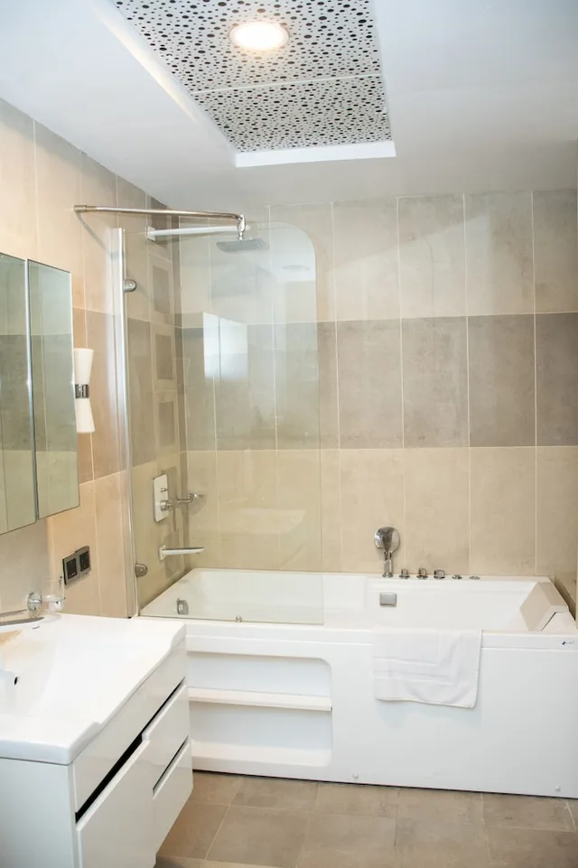 شقة بسرير كينج وسريرين مزدوجين بـ3 غرف نوم، Centaurus Hotel Suites 8/10