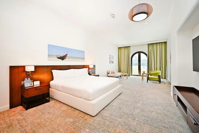 غرفة ديلوكس بسرير كينج، Mina Hotel and Residences 3/6