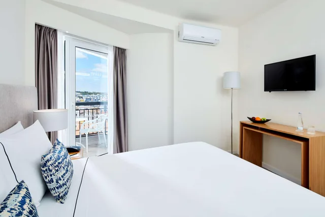 غرفة عائلية بإطلالة على المسبح، NH Lagos Algarve Resort 2/9
