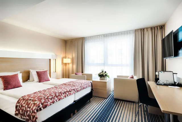 غرفة ديلوكس بسريرين منفصلين بحوض استحمام، Best Western Plus Welcome Hotel Frankfurt 1/3