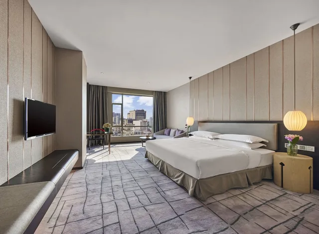 غرفة ديلوكس بسرير كينج، Maison New Century Hotel Dongguan 1/4