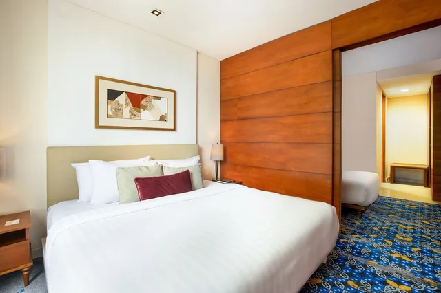 جناح بسرير كوين وسرير فردي، Jambuluwuk Malioboro Hotel Yogyakarta 3/6