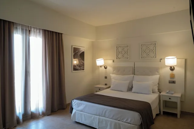 Room, Twin Beds, Lagoon View, Sofa، Vila Gale Isla Canela 7/10