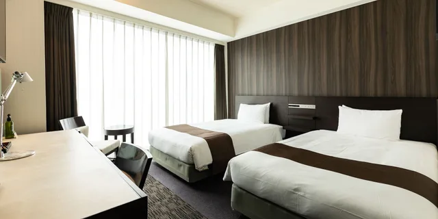 غرفة بسريرين منفصلين بإطلالة، KOKO HOTEL Premier Hakata 3/4