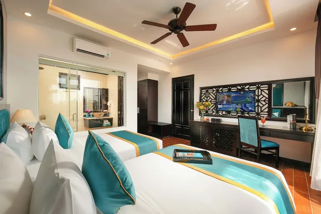غرفة ديلوكس بسرير كينج بشرفة، Silk River Hoi An Hotel & Spa 2/4