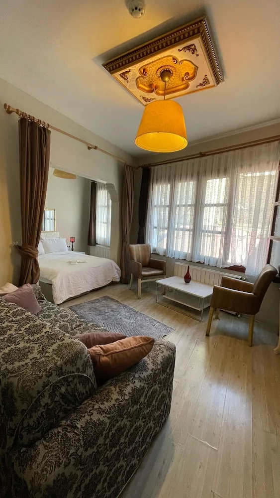 Family, Quadruple, 1 Queen and 2 Bunk Beds, Sofa, Chez Bore Boutique Hotel 1/10