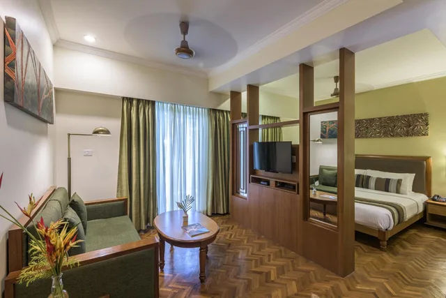 غرفة عائلية بسرير مزدوج وسريرين منفصلين، Club Mahindra Mount Serene Munnar 1/1
