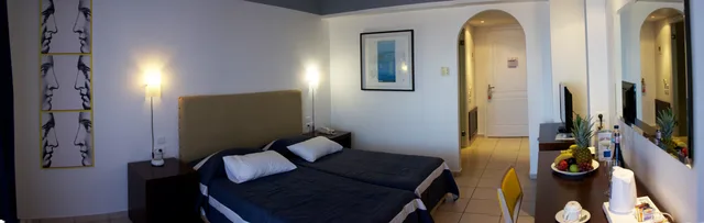 غرفة بسرير مزدوج أو سريرين منفصلين بإطلالة على الحديقة، Apostolata Island Resort and Spa 1/1