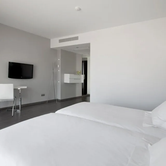 غرفة ثلاثية، Hotel Masmonzon 2/4