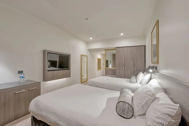 غرفة ديلوكس بسريرين مزدوجين، Duxton Hotel 3/5
