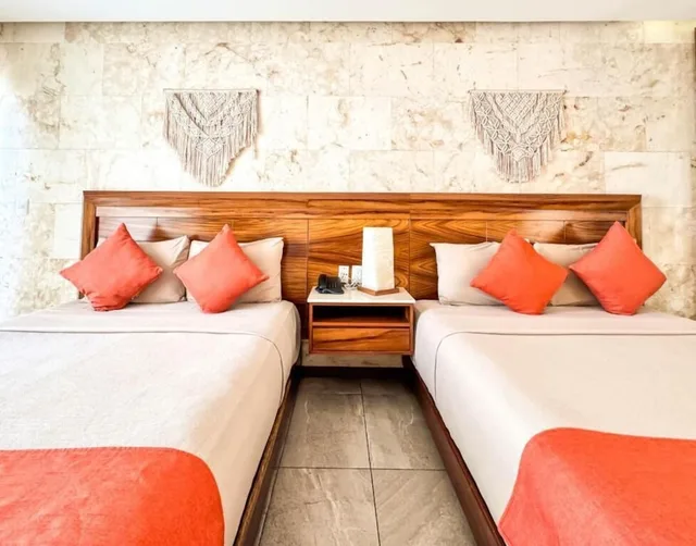 غرفة كومفورت بسريرين كوين مع أريكة، Grand Fifty Suites 9/10