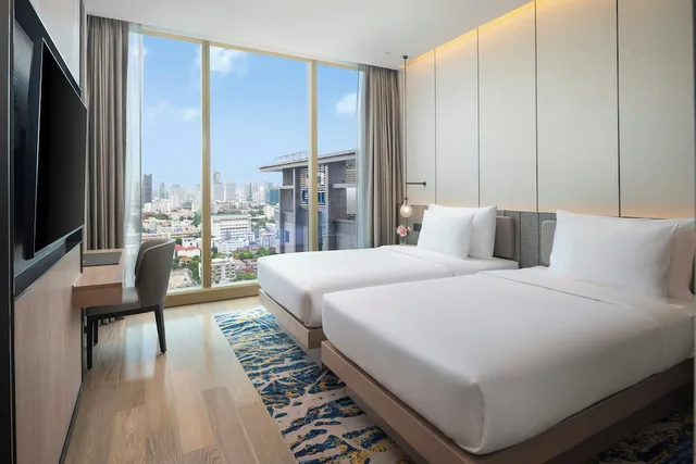 غرفة ديلوكس بثلاثة أسرّة بغرفتي نوم، Grand Nikko Bangkok Sathorn 3/5
