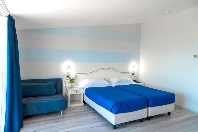 غرفة ديلوكس بسرير مزدوج أو سريرين منفصلين بإطلالة على البحيرة، AHG Riva del Sole Wellness Hotel 9/10