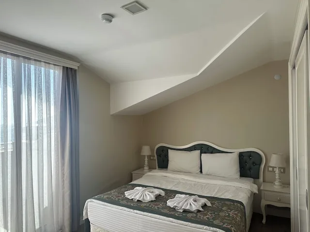 غرفة اقتصادية بسرير كوين مع أريكة، Daphne Residence 2/10