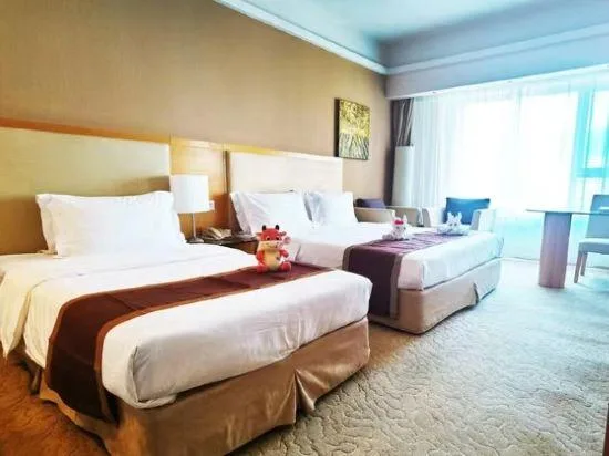غرفة ديلوكس عائلية بسرير كوين وسرير فردي، Haiyue Jianguo Hotel 2/2