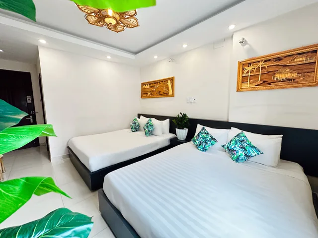 غرفة عائلية رباعية بسريرين كوين، Calmette Hotel 1/6