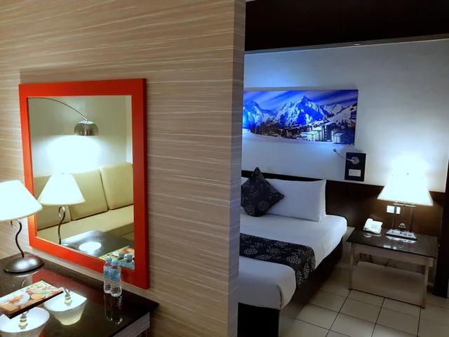 غرفة بريميوم بسرير كوين، Executive Hotel Manila 5/7