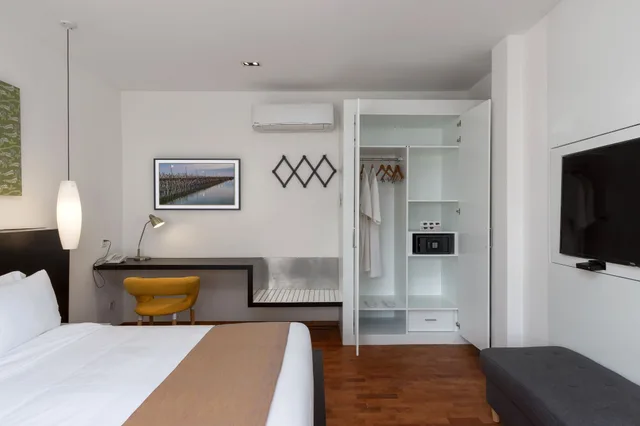 جناح تنفيذي بسرير كينج مع أريكة، Tao Riverside Residence 1/2