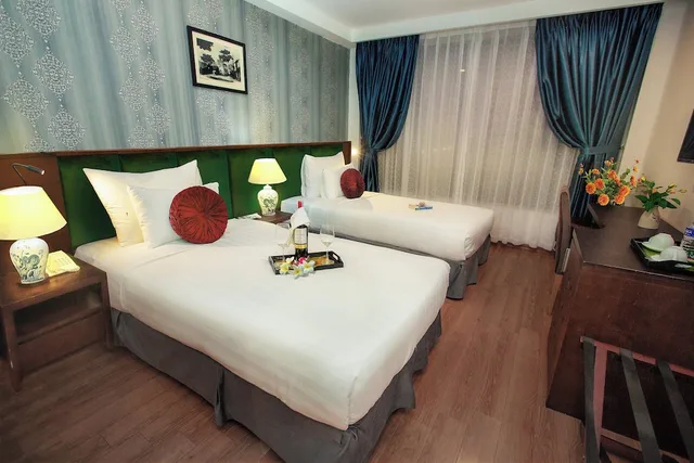 غرفة ديلوكس بسرير كوين، Aviary Hanoi Hotel and Travel 2/8