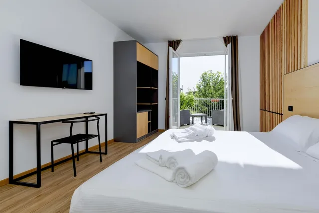 جناح عائلي بسرير كوين وسرير فردي بمطبخ صغير، Best Western Hotel Arya 5/11