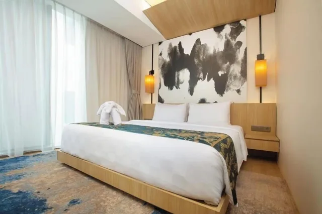 غرفة ديلوكس بسرير كينج، LK Hotel Chadstone Cikarang 1/1