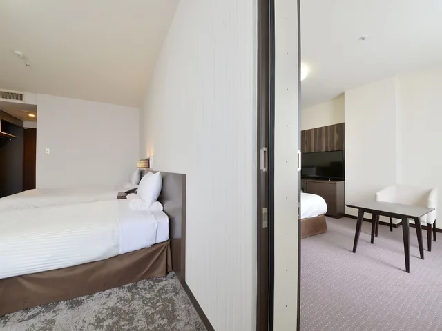 غرفة متصلة قياسية بأربعة أسرّة وسريرين منفصلين للمدخنين، Hakodate Kokusai Hotel 2/3