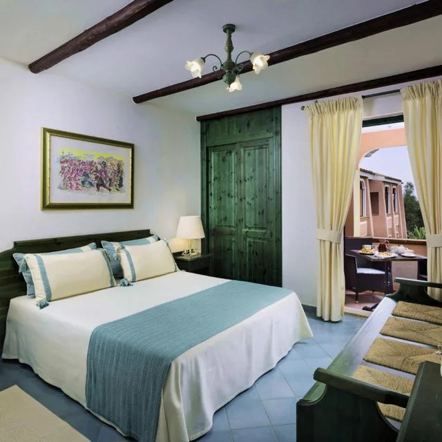 غرفة بسرير مزدوج أو سريرين منفصلين، CALA GINEPRO RESORT AND SPA 2/4