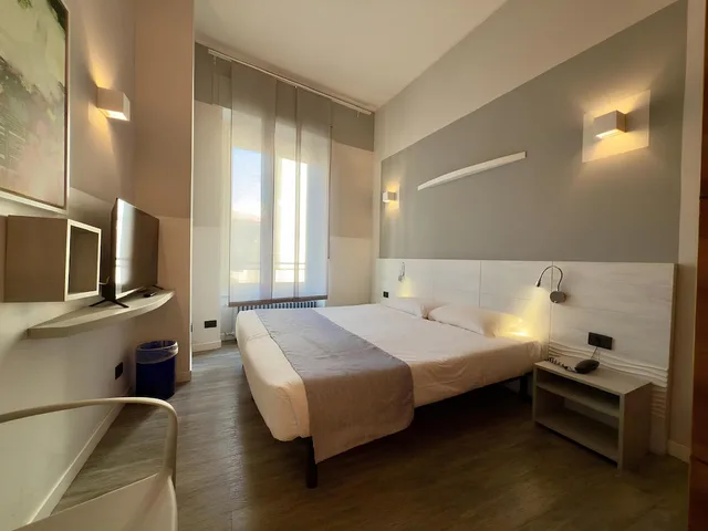غرفة قياسية رباعية بسرير مزدوج وسريرين منفصلين، Hotel Europa 4/10