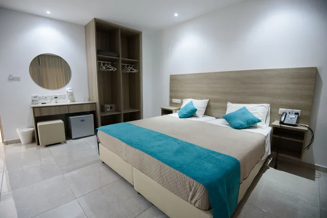 غرفة بسريرين منفصلين بإطلالة على المسبح مع أريكة، Annex Apartments 1/10