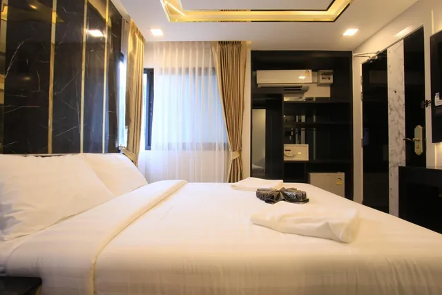 غرفة ديلوكس بسرير كوين بحوض استحمام، Pratunam Atrium Hotel 1/1