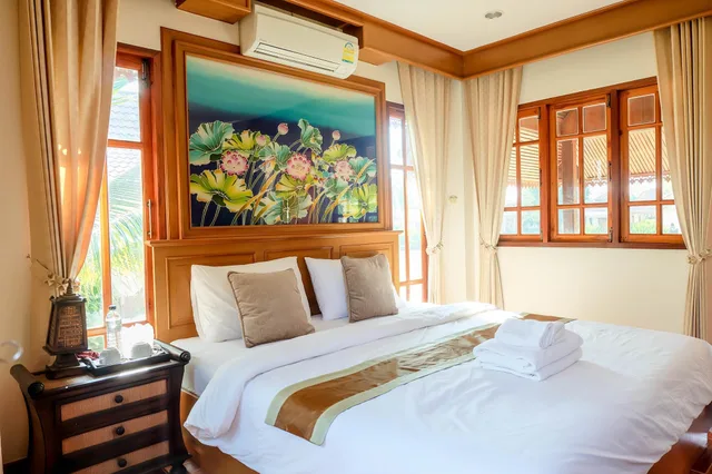 بنغل ديلوكس بسرير كوين بإطلالة على الحديقة، Thaisomboon Bighome Resort 1/1