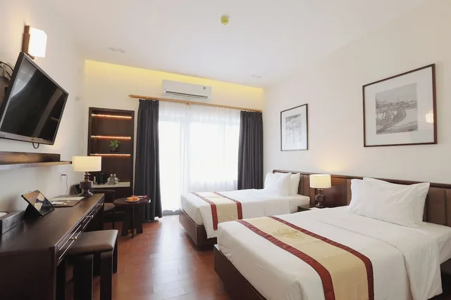 غرفة بريميير بسريرين منفصلين بإطلالة على الحديقة، Huong Giang Hotel 1/10