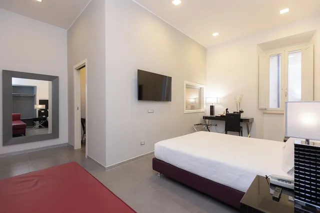 جناح عائلي بسرير كينج وسريرين منفصلين، Hotel Castellino Roma 2/10