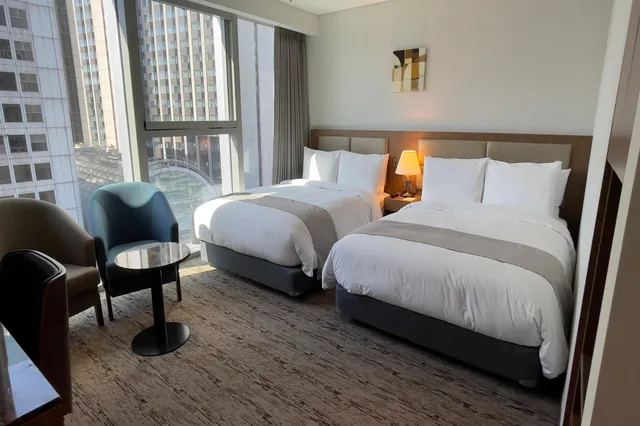 غرفة عائلية ركنية بسريرين منفصلين، Stanford Hotel Myeongdong 1/3