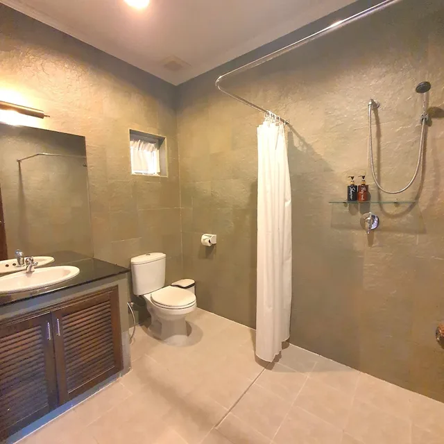 غرفة عائلية بسرير كينج وسرير فردي، Serene Sands Health Resort 4/4