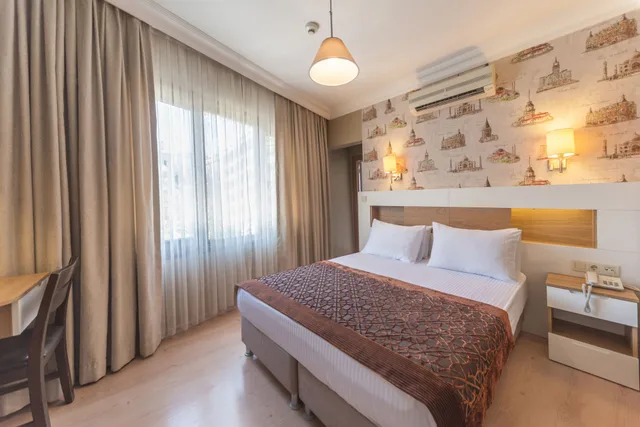 غرفة قياسية بسرير كوين وسرير مزدوج بغرفة نوم واحدة، TAYA HATUN HOTEL 1/10
