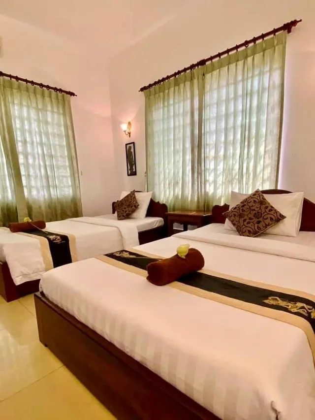 غرفة عائلية، Tropical Breeze Guesthouse 1/4