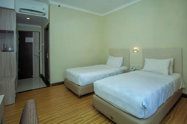 غرفة ديلوكس بسريرين منفصلين، Grand Q Hotel Gorontalo 4/5