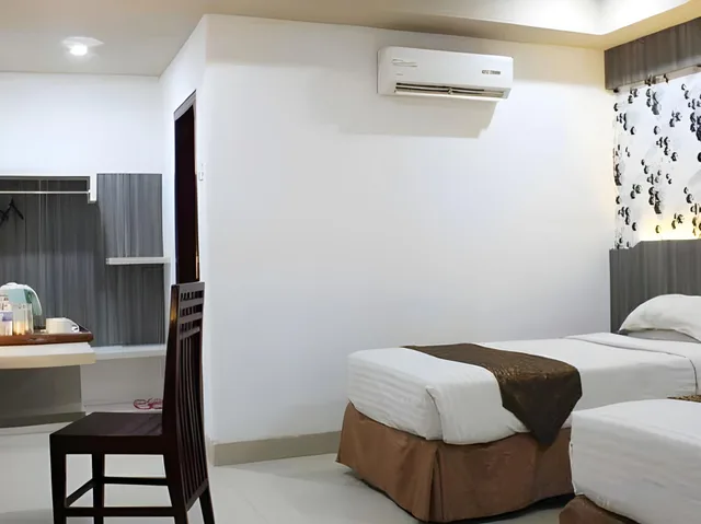 غرفة سوبيريور بسريرين منفصلين، Grand Hotel Jambi 1/1