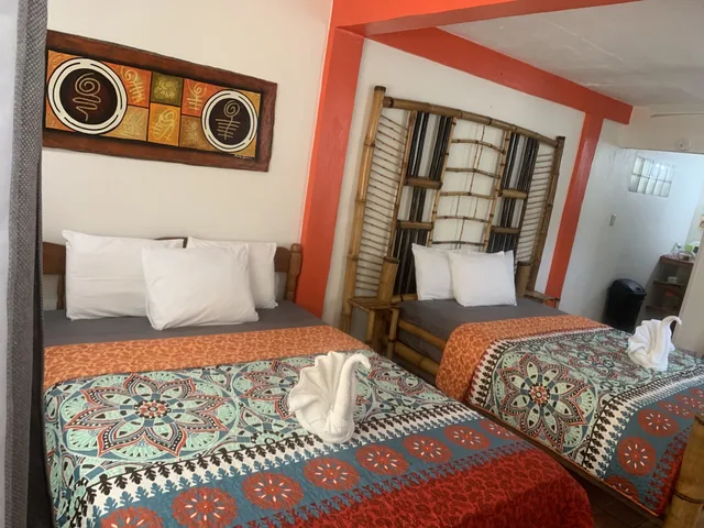 Standard, 2 Queen Beds, Courtyard Area، All Seasons Guest House 3/10