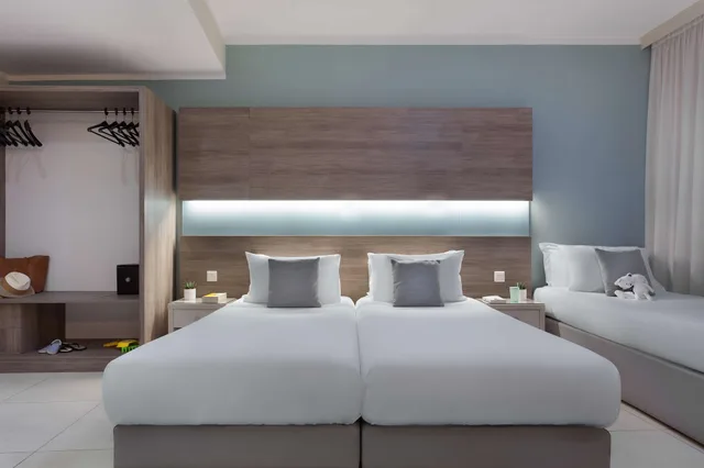 غرفة عائلية بثلاثة أسرّة، 115 The Strand Hotel And Suites 2/9
