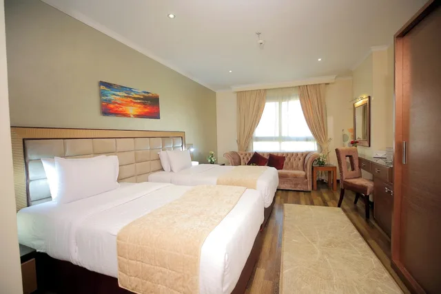 غرفة ديلوكس بسرير كوين، Cairo Taj Dokki Families Tower Hotel 1/7